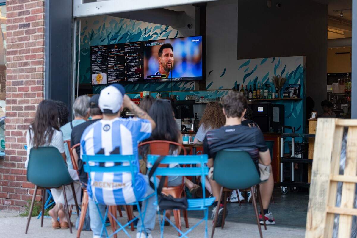 Fans at Café Corazón on Southwest Boulevard cheer on Argentina during a watch party for the World Cup game between Algeria and Argentina, which was held in Kansas City, on Tuesday, June 16, 2026.