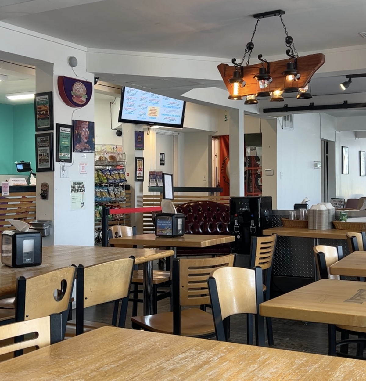 Bay Boy has table and bench seating in its upper level, right in the same room as the small assembly kitchen where customers place their order. After ordering, customers get a number and their food is brought to them.