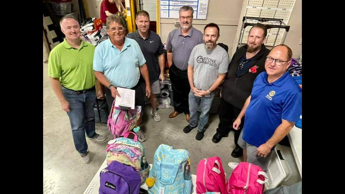 Volunteers — like these members of the Lee’s Summit Rotary Club — are critical to the success of the school supplies distribution at Lee’s Summit Social Services. The nonprofit is looking for volunteers and donations for this year’s distribution, which will begin Aug. 1.