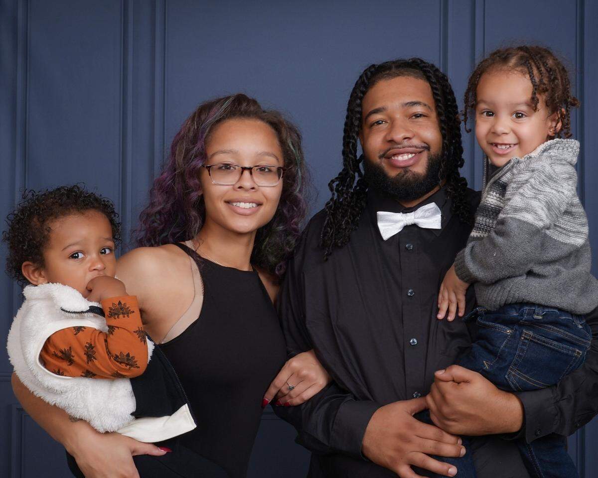 Juavvion Bagsby, 29, center right, is pictured with his wife Kierra Turner, center left, and two of their sons. Bagsby was shot and killed Sept. 29 during a confrontation with a man who had allegedly assaulted his wife and children at their home in Independence.