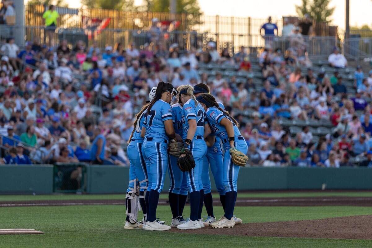 The KC Diamonds huddle during their home opener at Legends Field on Wednesday, June 17, 2026. They defeated the Florida Vibes 5-3.