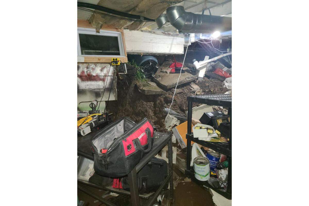 The inside of Manuel Ramirez’s basement after the wall collapsed during severe storms. The wall will have to be completely rebuilt.