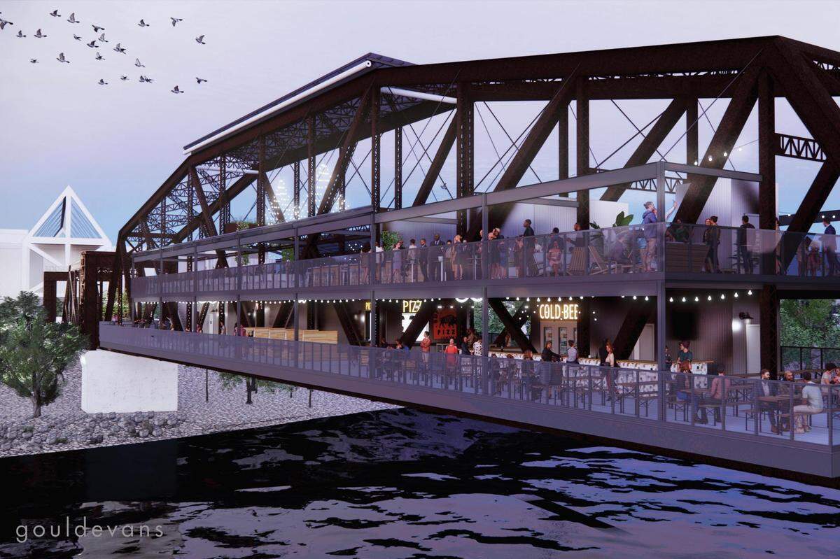 This architectural rendering shows plans for the revamped Rock Island Bridge over the Kansas River. Developers plan to open a public trail, bars, restaurants, coffee shops and an entertainment venue on the now-closed bridge.