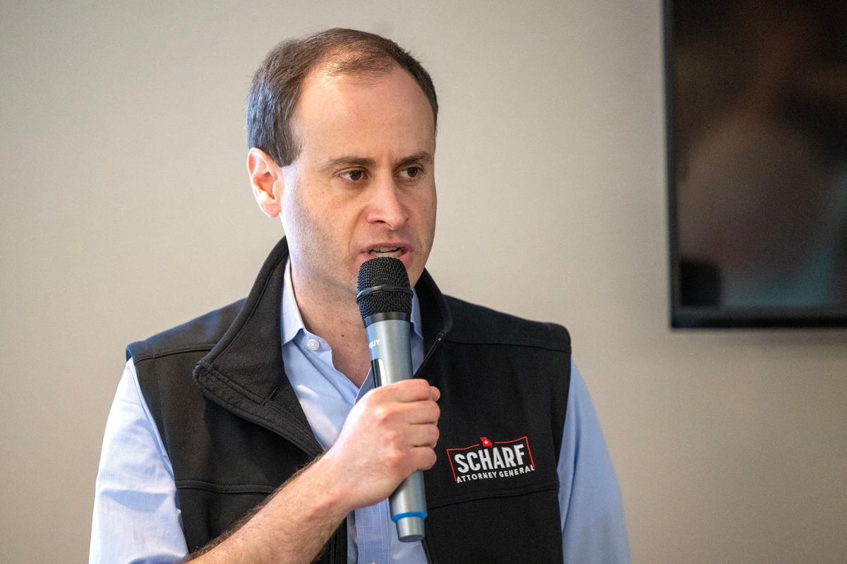 Will Scharf, a Republican candidate for Missouri Attorney General and an attorney for Donald Trump, speaks to members of the Jackson County Republican Party about the attempted assassination of former President Donald Trump. Scharf spoke during a GOP ice cream social in Kansas City on Sunday.