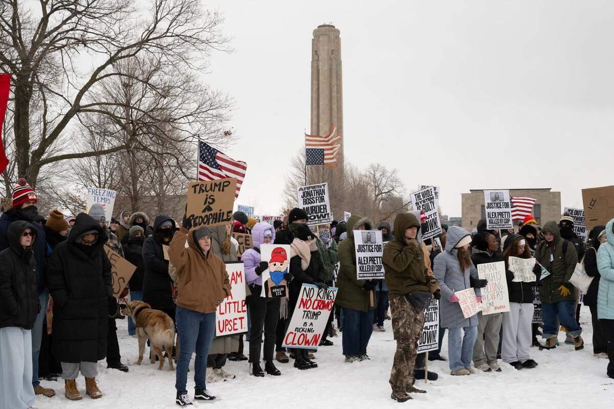 Protesters gathered at the World War I Museum and Memorial to rally against recent ICE actions across the U.S. and in Kansas City on Friday, January 30, 2026.