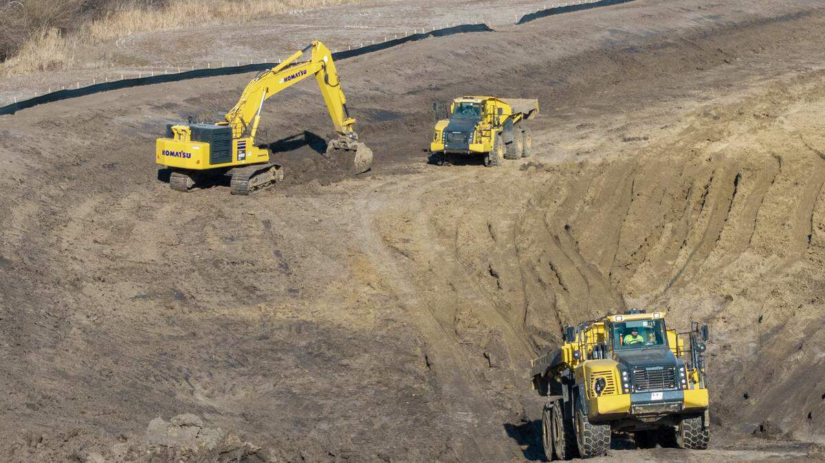 Heavy equipment works on the site of a proposed supersize data center on Bly Road in eastern Independence on Friday, Feb. 13, 2026. Nearby residents oppose the planned 400-acre, $6.6 billion AI facility.