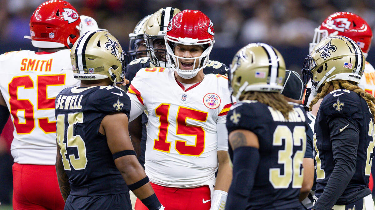 Kansas City Chiefs quarterback Patrick Mahomes (No. 15) shares words with Saints linebacker Nephi Sewell (45) and former KC safety Tyrann Mathieu (32) on Sunday in New Orleans.