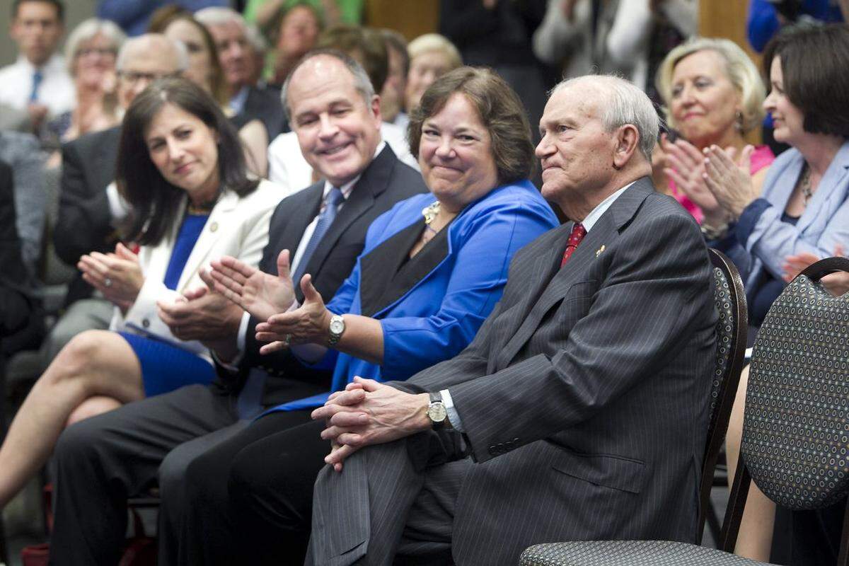 The KU Endowment’s announcement of a $25 million gift from the Hall Family Foundation for a new health education building brought applause from Rep. Melissa Rooker, from left, Keith Pence, his wife Margi Hall Pence and others for Donald J. Hall, right, who was on hand for the announcement Tuesday, May 19, 2014.