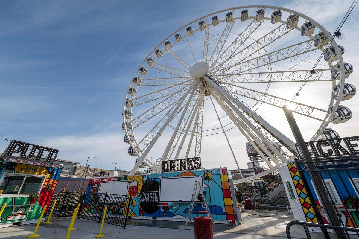 A concession stand and ticket windows are at the entrance to the KC Wheel at Pennway Point district.