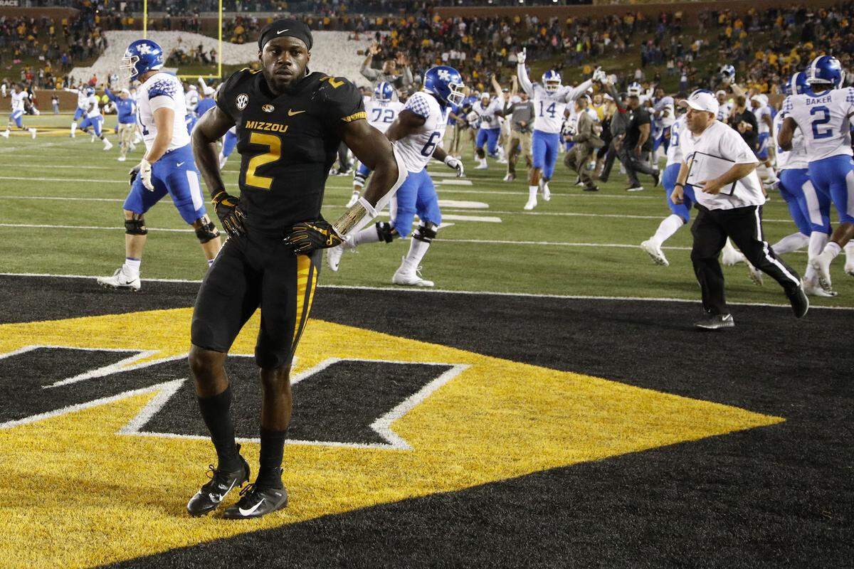 Missouri defensive back DeMarkus Acy stood in the end zone while Kentucky players celebrated after UK scored a touchdown on the game’s final play to beat Mizzou 15-14 last season in Columbia.