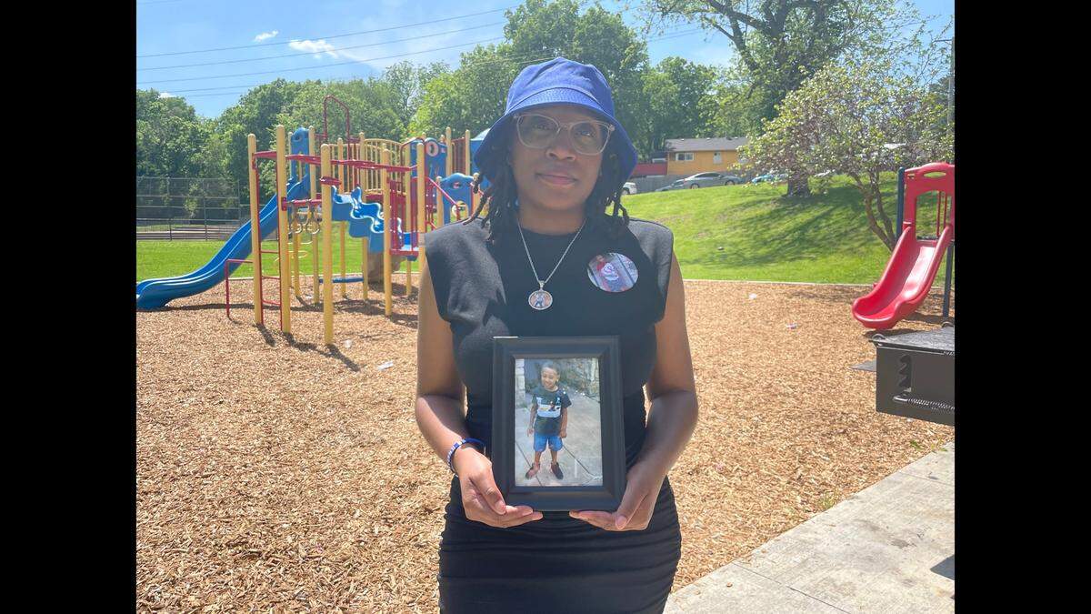 Charron Powell, mother of four-year-old LeGend Taliferro who was shot and killed in 2020, spoke at an event at Hibbs Park about the loss of her son. She said seeking mental health counseling and leaning on others in the community has helped her survive.