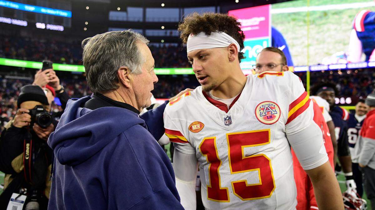 New England Patriots head coach Bill Belichick shakes hands with Kansas City Chiefs quarterback Patrick Mahomes (15) after a game at Gillette Stadium on Dec. 17, 2023.