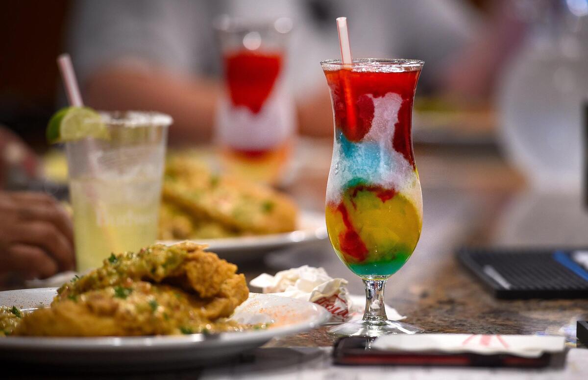The Bob Marley drink features three flavors of daiquiris: Hulk, mango and strawberry.