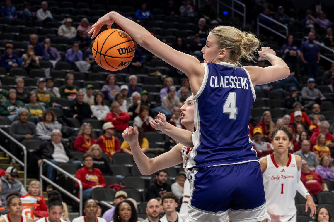 Kansas State Wildcats forward Nastja Claessens (4) blocks a pass by Texas Tech Red Raiders guard Bailey Maupin (20) during the fourth quarter of the Big 12 Women's Basketball Tournament at T-Mobile Center on Thursday, March 5, 2026, in Kansas City.