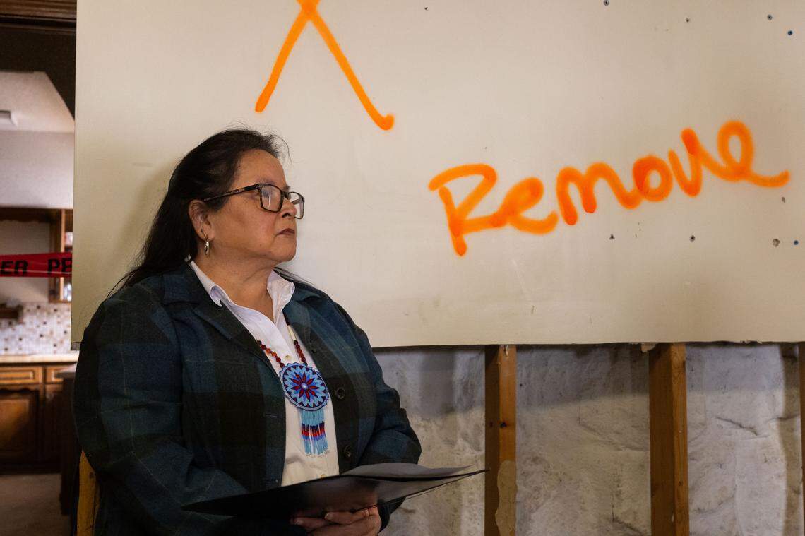 Rev. Sunrise Ross listens to speakers in the basement of Grinter Chapel during a ceremony on Thursday, March 12, 2026, in Kansas City. The deed to the former church property was given back to the Kansas Delaware Tribe of Indians, Inc. 