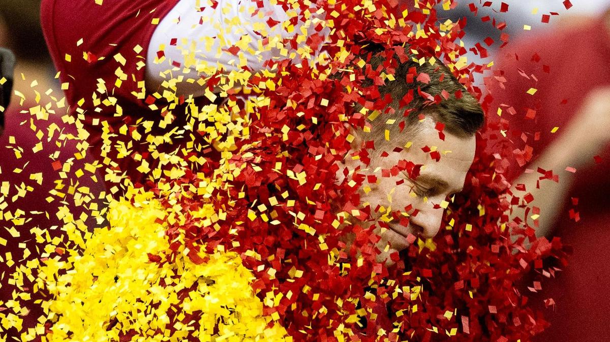 Iowa State Cyclones head coach T. J. Otzelberger gets doused with confetti after Iowa State defeated the Houston Cougars in the Big 12 men’s basketball tournament championship game on Saturday, March 16, 2024, in Kansas City.