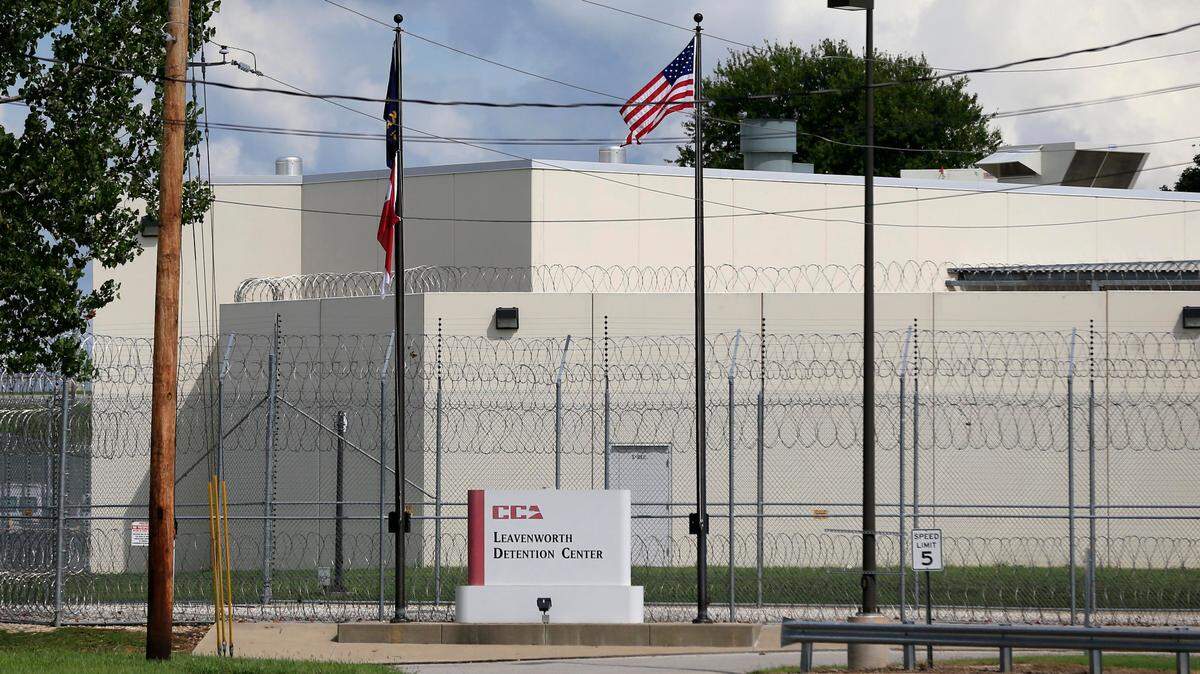 This 2016 file photo shows the main gate of the Leavenworth Detention Center. The center, operated by private prison company CoreCivic, has been the site of two suicides and at least 10 severe beatings and stabbings this year, according to attorneys representing inmates there.
