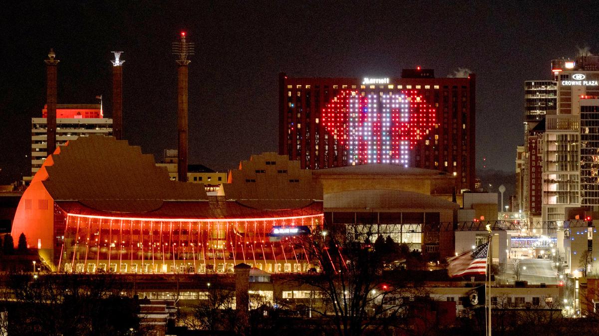 The downtown Marriott Hotel is lit up early Friday morning with a red heart and KC lettering after the Chiefs Super Bowl rally shooting in Kansas City.