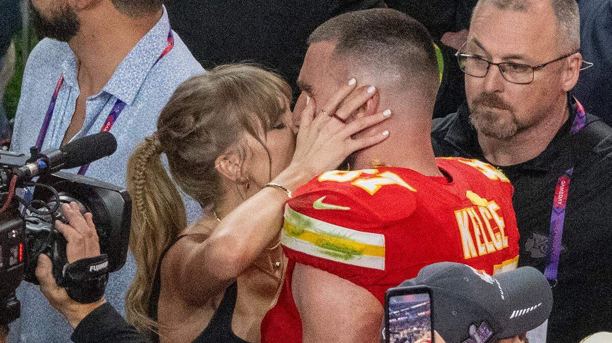Taylor Swift congratulated Kansas City Chiefs tight end Travis Kelce with a kiss after the Chiefs won the Super Bowl in Las Vegas on Feb. 11. On Wednesday Kelce was reportedly on his way to Sydney, Australia, where Swift begins a four-night stand of her Eras Tour.