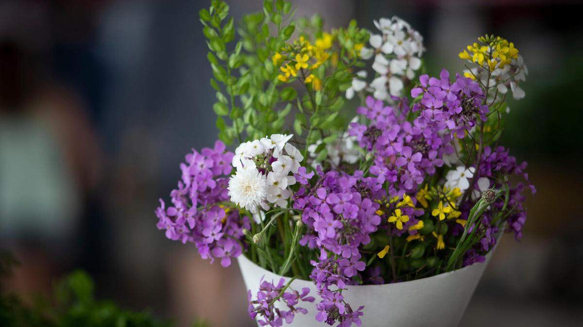 Flower bouquets with phlox and mustard greens were for sale for Mother’s Day on Saturday, May 8, at the City Market in Kansas City.