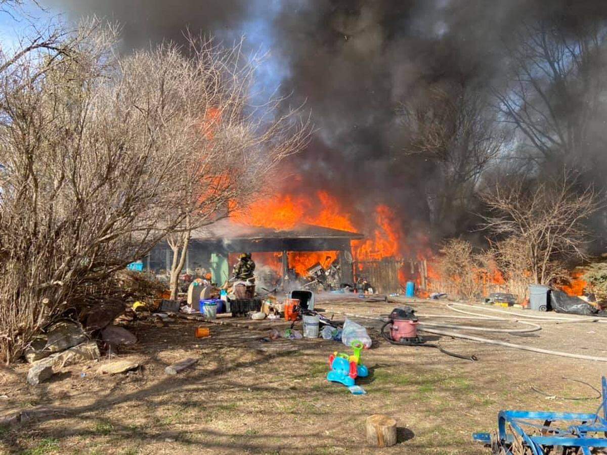 Fire crews battle a blaze near N.E. 136th and Cameron Road in Clay County.