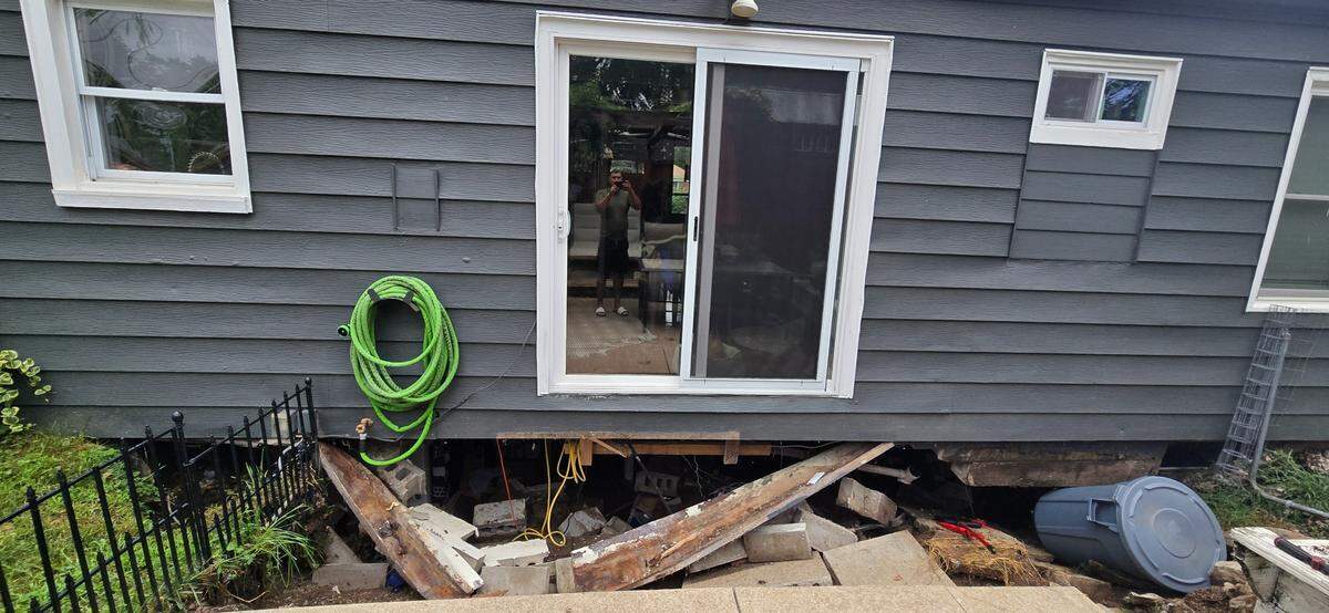 The outside of Manuel Ramirez’s Independence home after his basement wall collapsed during severe storms in mid-July. The damage led city officials to condemn the home. 