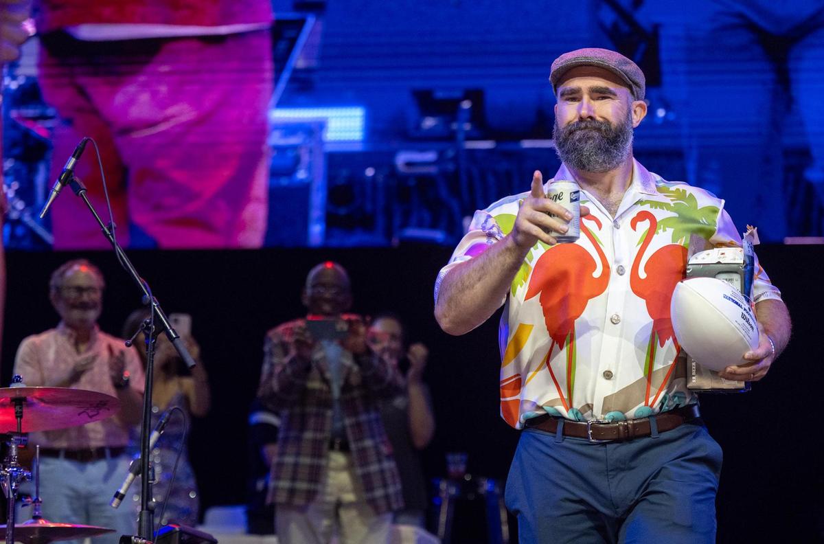 Jason Kelce on stage with Garage Beer and a football at the Big Slick Show on Saturday, May 31, 2025, at the T-Mobile Center in Kansas City.