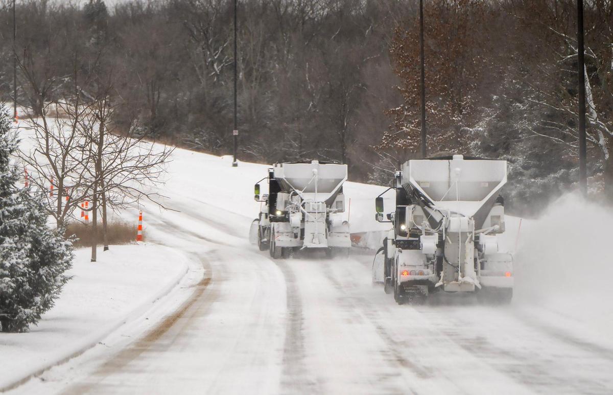 Snowplows from the City of Lenexa plowed Canyon Creek Boulevard in Lenexa after winter storm dumped several inches of snow overnight in the area on Wednesday, Feb. 12, 2025.