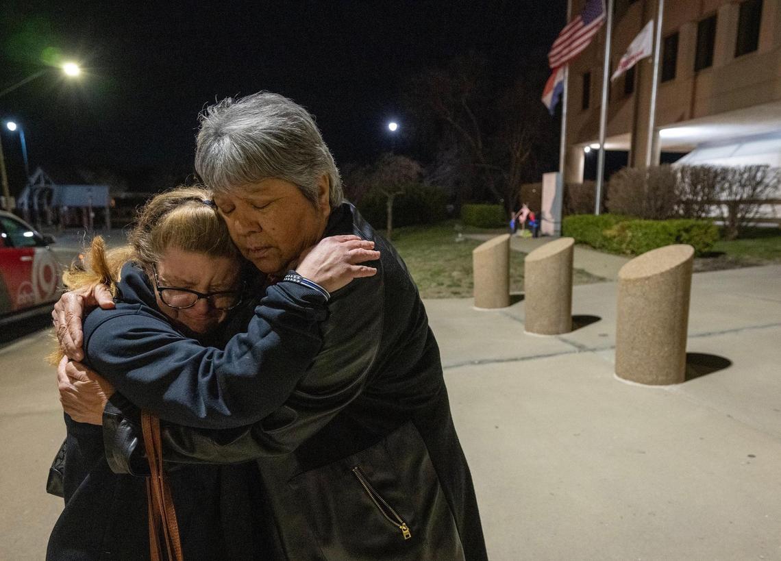Stephanie Collins, left, of Belton, and Patti Candillo of Independence, embraced after they paid their respects to fallen Independence police officer Cody Allen, who was shot and killed during an eviction Thursday, Feb. 29, 2024, in Independence. Collins said her brother Scott Collins, who had the day off, is an officer with the Independence Police Department. Her father is a retired police officer.