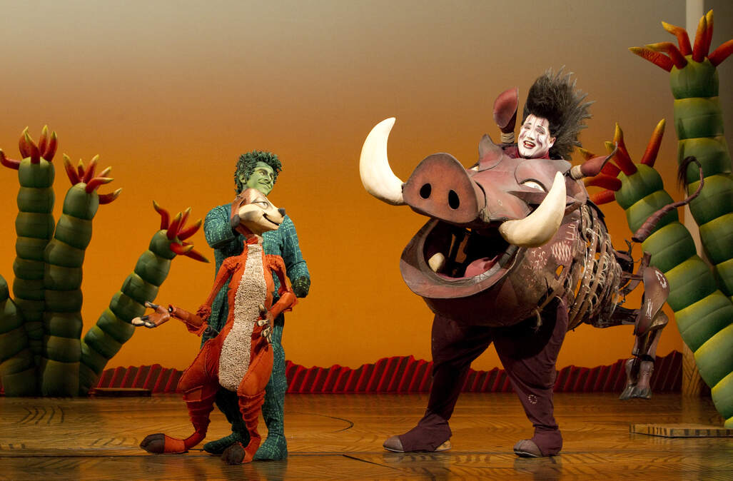 Kansas City native Ben Jeffrey (right), comes home to perform as Pumbaa, the flatulent warthog in Disney's "The Lion King" at Music Hall. For eight years, Jeffrey has played the role, opposite Fred Berman as the meerkat Timon, on Broadway.