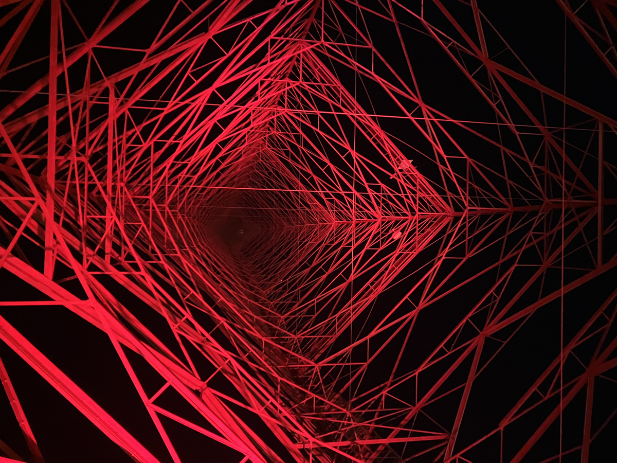 A look directly upward from underneath the massive KCTV-5 tower, which was illuminated red on Dec. 5.