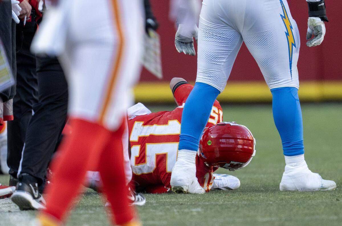 Kansas City Chiefs quarterback Patrick Mahomes (15) was injured in the fourth quarter on Sunday, Dec. 14, 2025, against the Los Angeles Chargers at GEHA Field at Arrowhead Stadium in Kansas City. The Chargers defeated the Chiefs, 16-13.