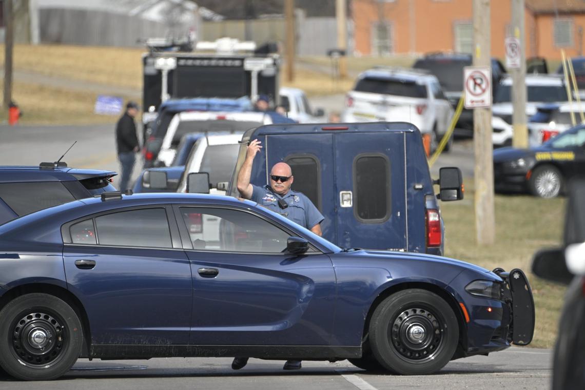 A police standoff continued Wednesday, March 1, 2023, after three Kansas City Police officers were shot and injured Tuesday night while serving a search warrant. Law enforcement continued to work from a command post at Lifegate Church, Blue Ridge Boulevard and Westport Road.