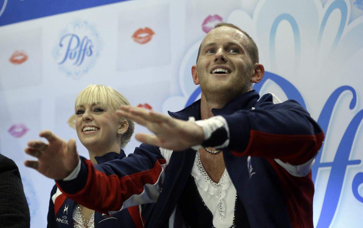 Caydee Denney and John Coughlin after their pairs free skating routine at the Skate America competition in Detroit in 2013. Coughlin, who is from Kansas City, was a two-time national pairs champion.