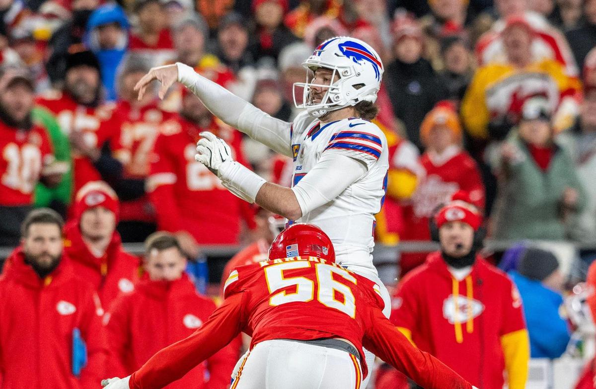 Kansas City Chiefs defensive end George Karlaftis (56) puts pressure on Buffalo Bills quarterback Josh Allen (17) in the second quarter during the AFC Championship Game on Sunday, Jan. 26, 2025, at GEHA Field at Arrowhead Stadium.
