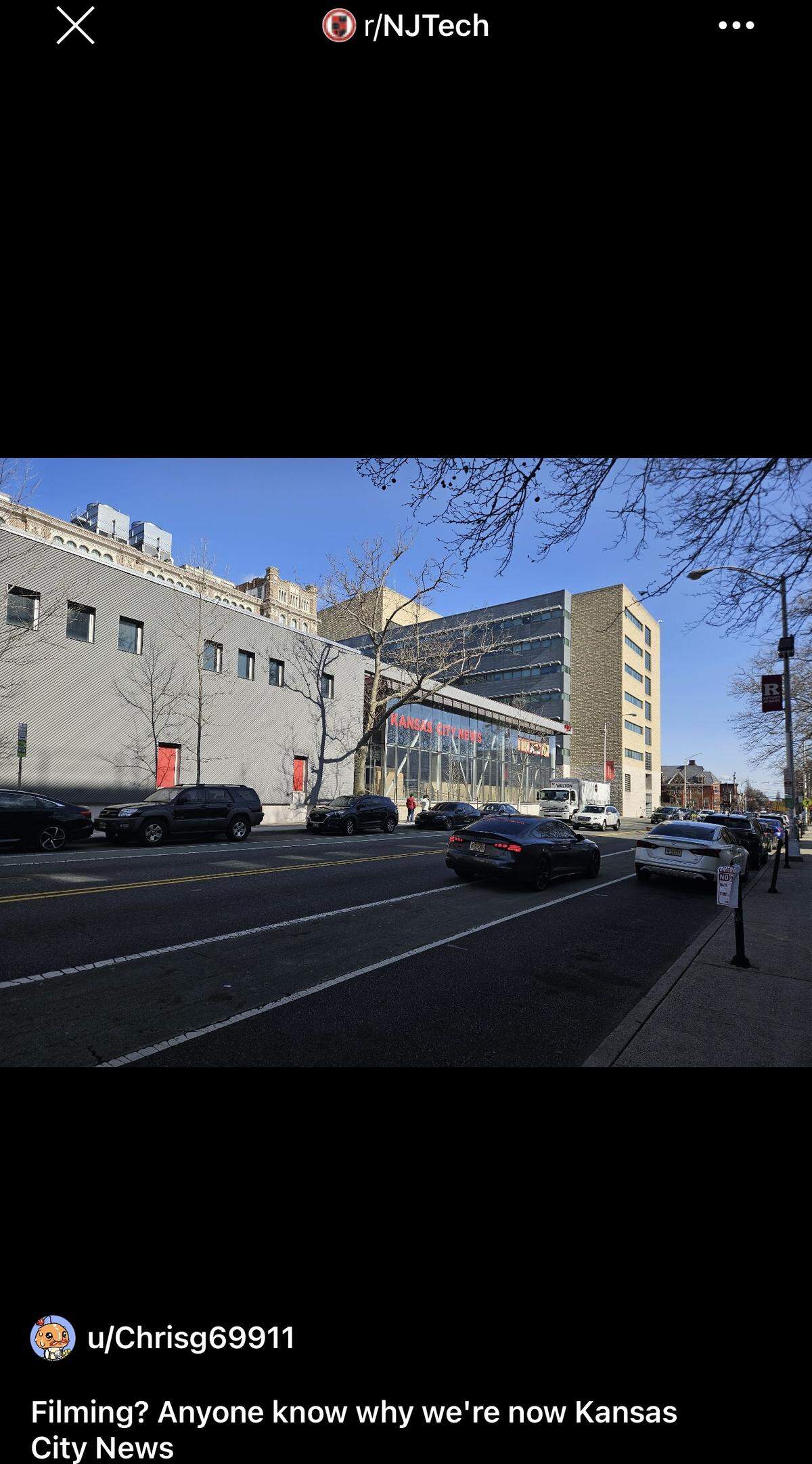 A Reddit user posted a photo of a college campus building in New Jersey outfitted as a Kansas City media outlet on the set of Spielberg’s movie.