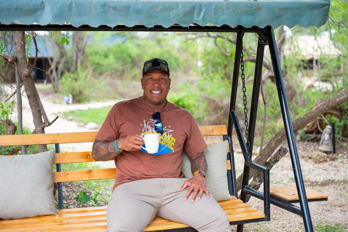 Kansas City Royals superstar Salvador Perez enjoys a beverage during his nearly two-week-long trip to Kenya this past offseason.