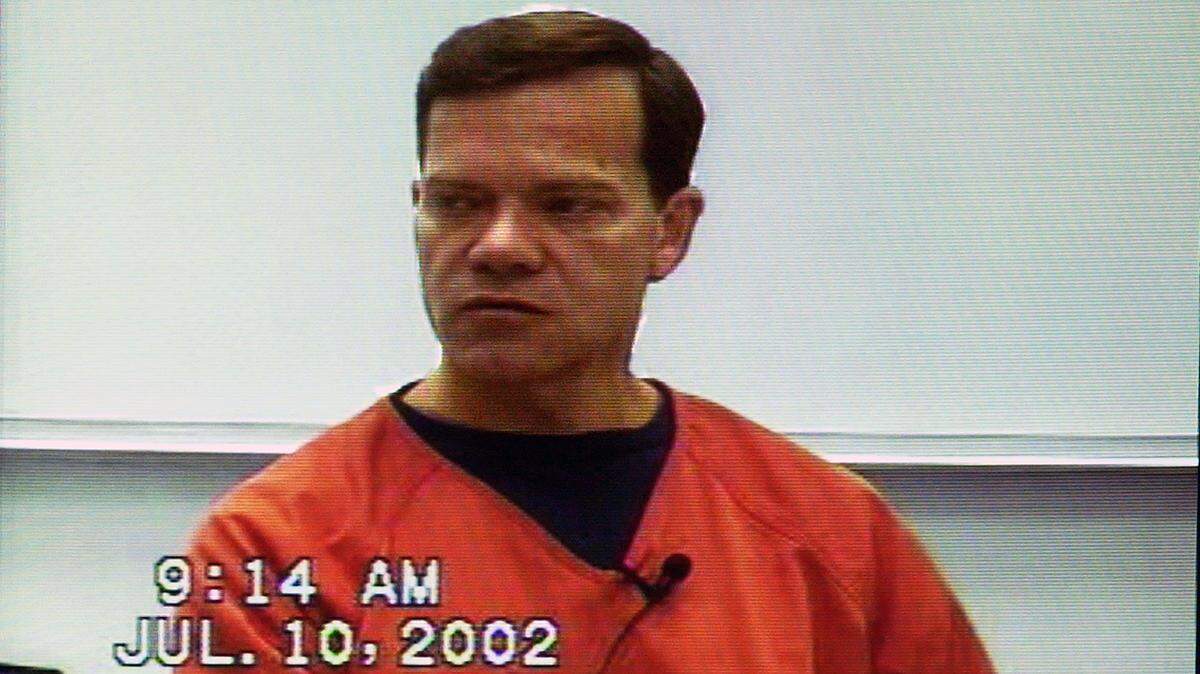 Former Kansas City pharmacist Robert Courtney, seen in a video shown during a 2002 civil trial, was convicted on charges of diluting prescription drugs for cancer patients. He will be released from prison in June.