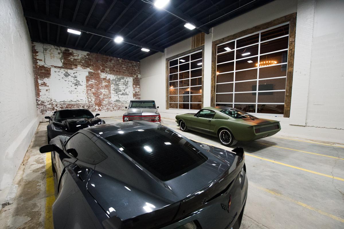 The showroom area inside the warehouse is for cars to sell and rent.