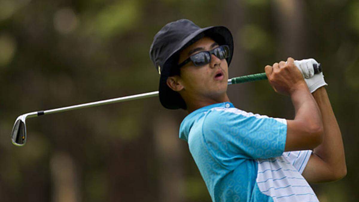 Zecheng “Marty” Dou, 23, shares the first-round lead at the Wichita Open after firing a Thursday 7-under 63 at Crestview Country Club.