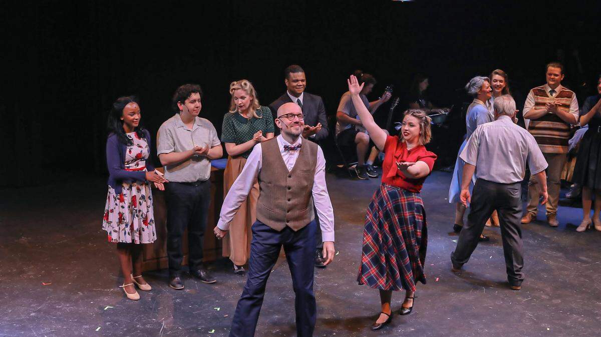 Brad Rackers (front and center) performing in “Bright Star” with Summit Theatre Group in May 2023.