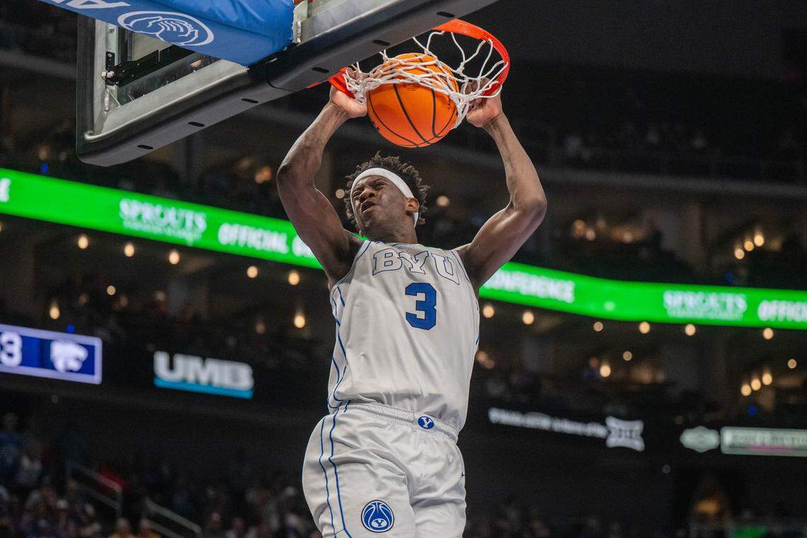 BYU Cougars forward AJ Dybantsa (3) dunks the ball on a fast break in the second half of the Wildcats first round game vs. the BYU Cougars in the Big 12 Men's Basketball Tournament, on Tuesday, March 10, 2026, at T-Mobile Center. The Wildcats lost to BYU, 105-91.