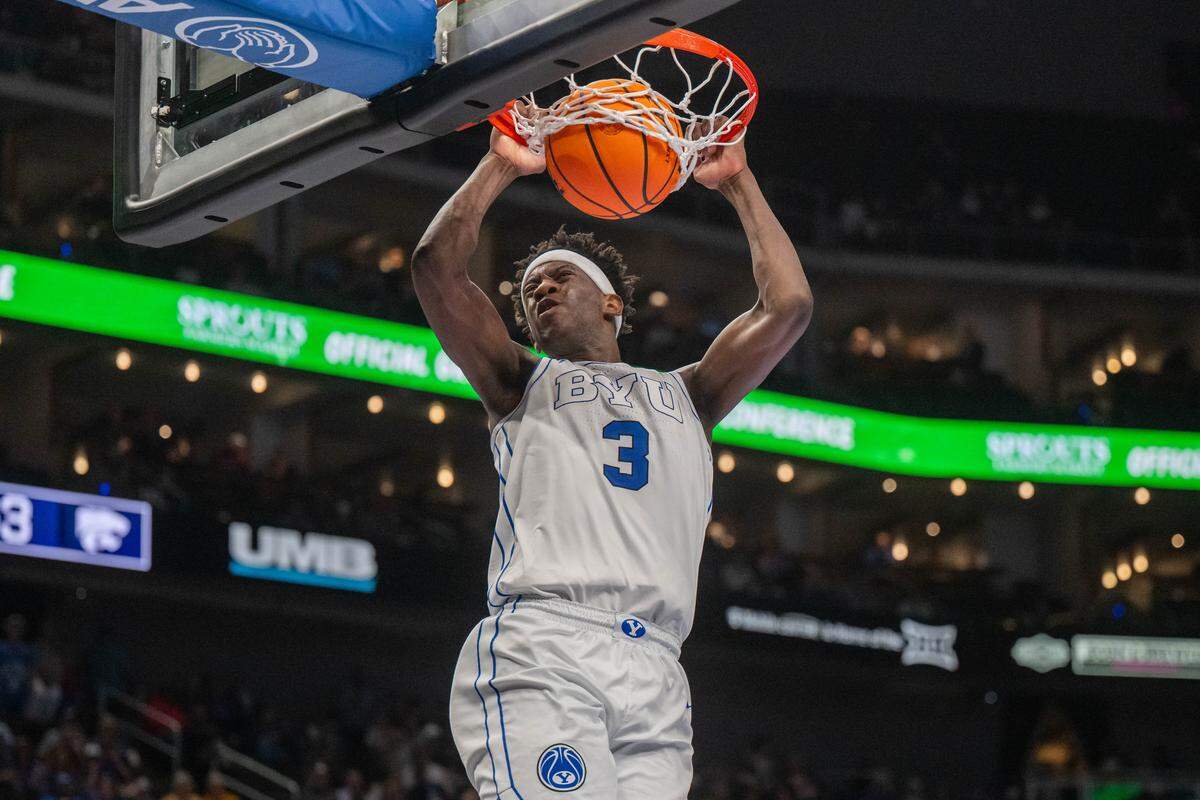 BYU Cougars forward AJ Dybantsa (3) dunks the ball on a fast break in the second half of the Wildcats first round game vs. the BYU Cougars in the Big 12 Men's Basketball Tournament, on Tuesday, March 10, 2026, at T-Mobile Center. The Wildcats lost to BYU, 105-91.