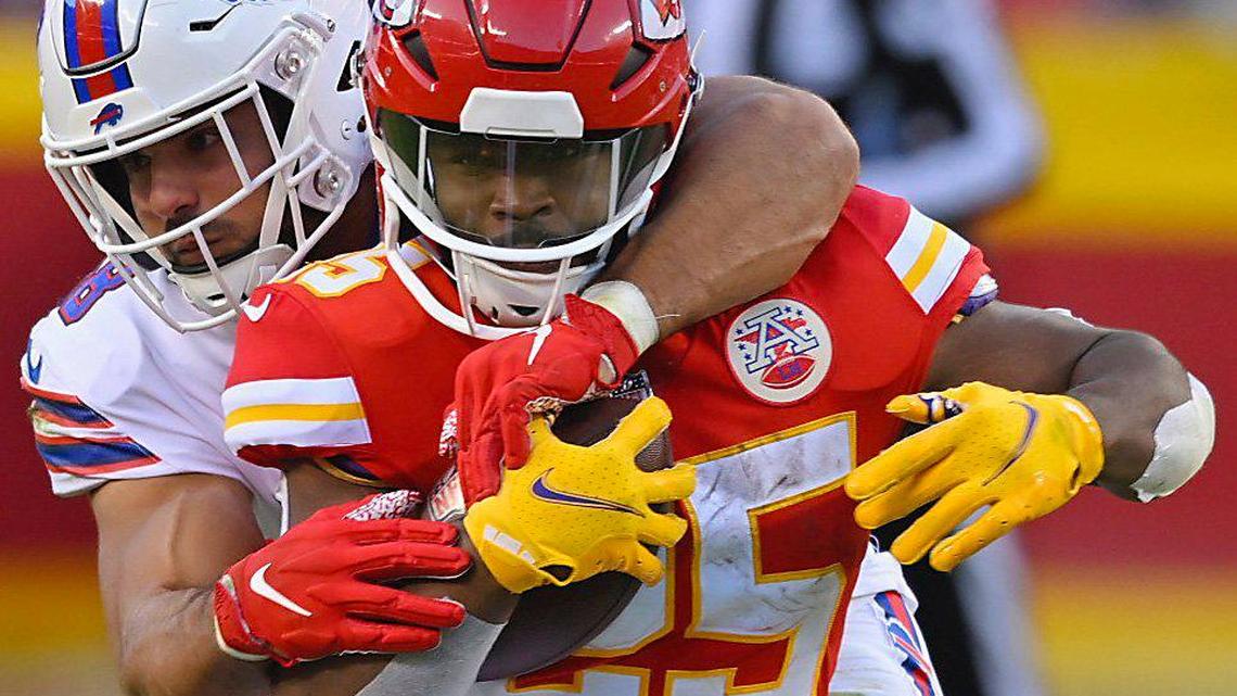 Buffalo Bills linebacker Matt Milano grabs Kansas City Chiefs running back Clyde Edwards-Helaire in the second half Sunday, October 16, 2022, at Arrowhead Stadium.