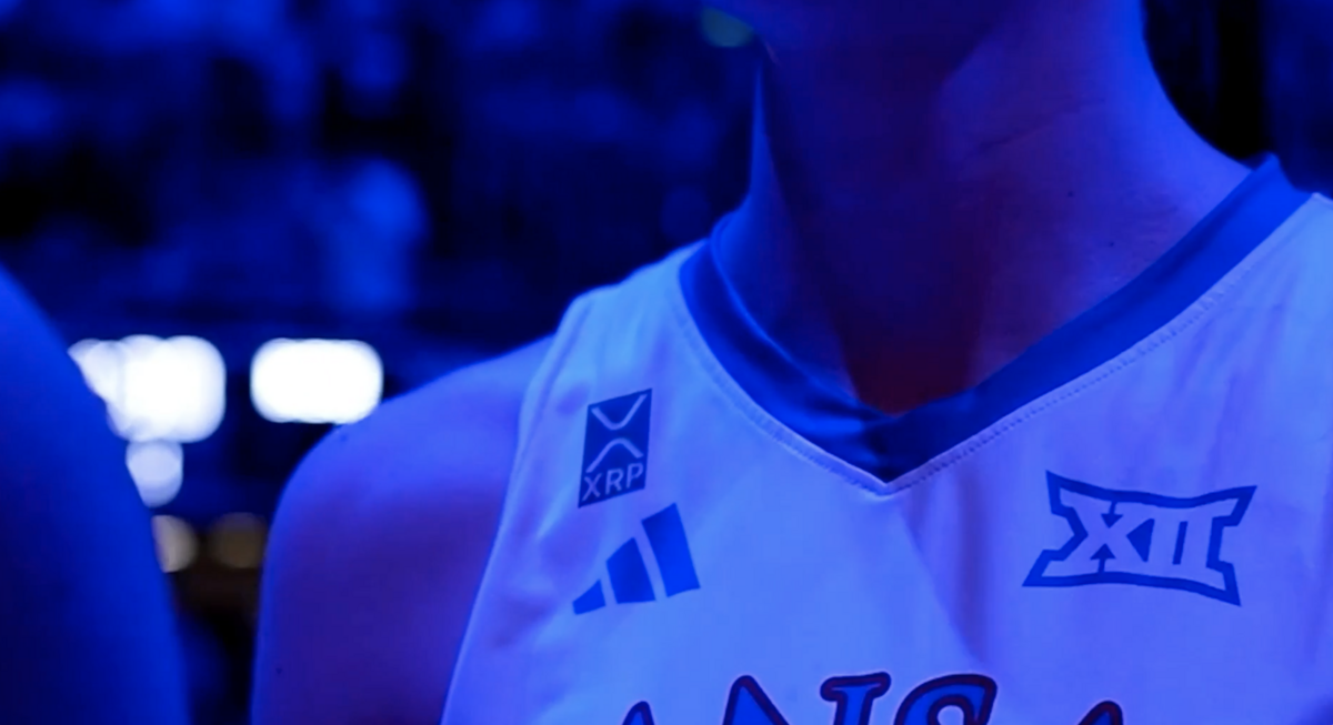The KU men’s basketball team, along with other Kansas Athletics programs, will wear jersey patches for XRP Cryptocurrency starting in the 2026-27 season.
