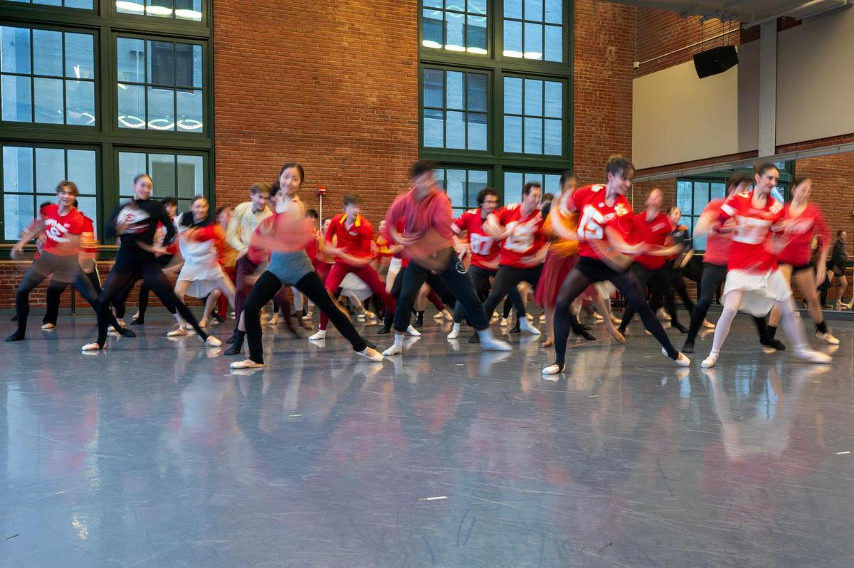 Kansas City Ballet Company dancers dance to the “NFL on CBS” theme song while they rehearse for their dance-off performance.