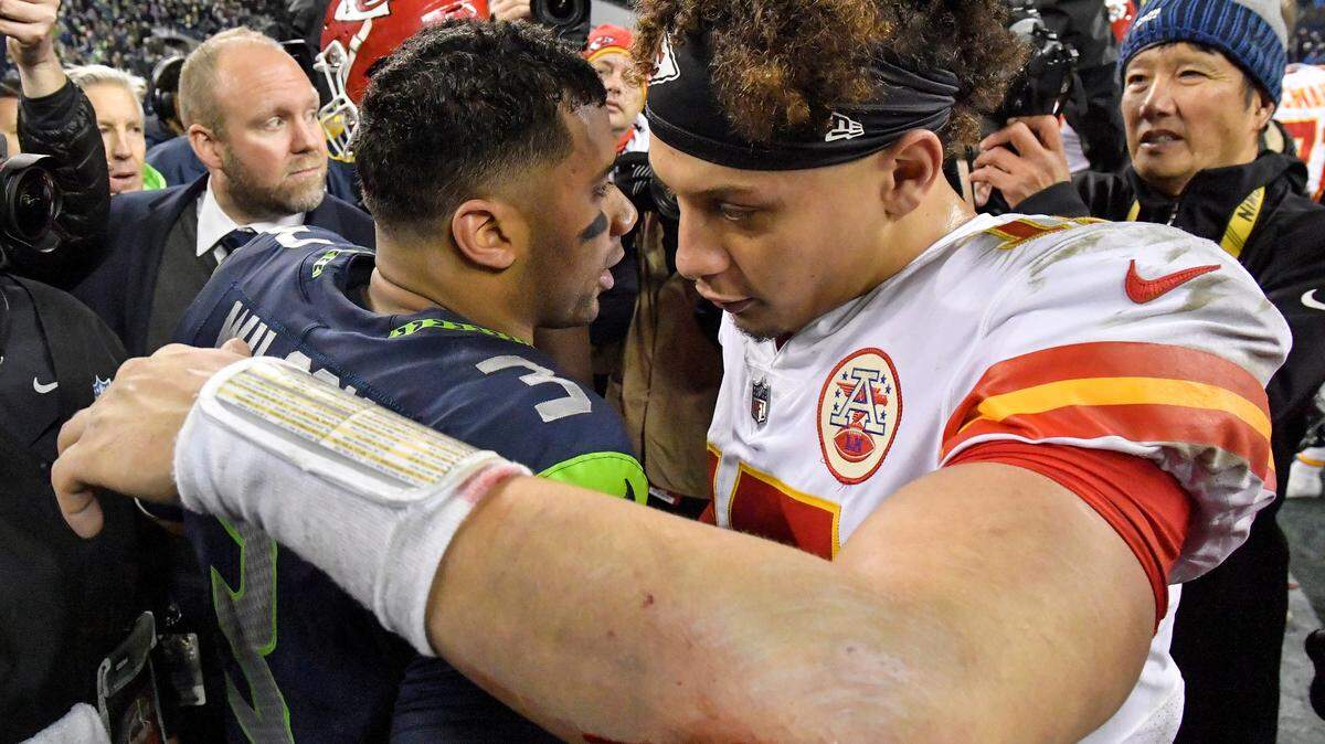 Kansas City Chiefs quarterback Patrick Mahomes and Seattle Seahawks quarterback Russell Wilson met on the field after the Chiefs lost to the Seahawks 38-31 after  Sunday’s football game on December 23, 2018 at CenturyLink Field in Seattle, Washington.