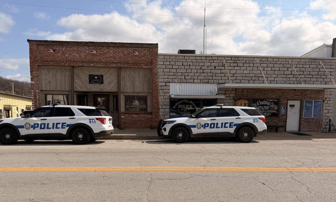 A new Southwest City Police car (left) is parked outside of the Missouri town’s police headquarters and city hall in this submitted photo. ICE gave the agency money for the vehicle for participating in the 287(g) program, said Harvey Gow, chief of police.