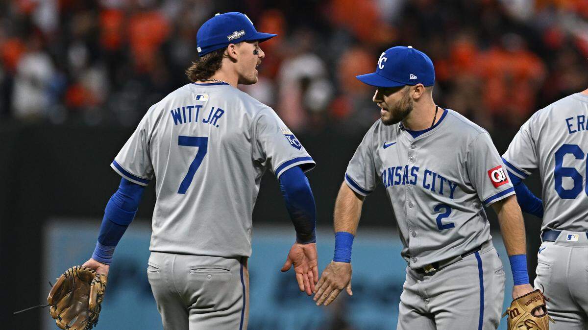 Kansas City Royals shortstop Bobby Witt Jr. (7) and outfielder Garrett Hampson (2) celebrate after defeating the Baltimore Orioles in Game 1 of the Wild Card round at Oriole Park at Camden Yards on Oct. 1, 2024.