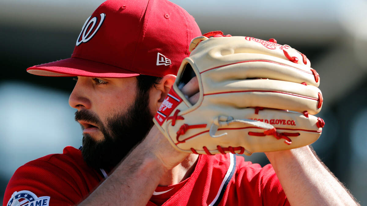 Washington Nationals pitcher Tim Collins throws a bullpen session during spring training baseball practice Saturday, Feb. 17, 2018, in West Palm Beach, Fla. (AP Photo/Jeff Roberson) 